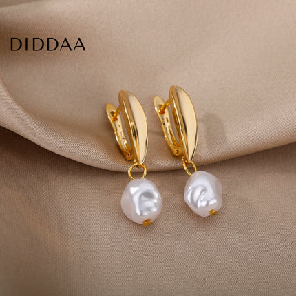 Detente Earrings | Gold Pearl Luxury Drop Earrings - Gold - Earrings