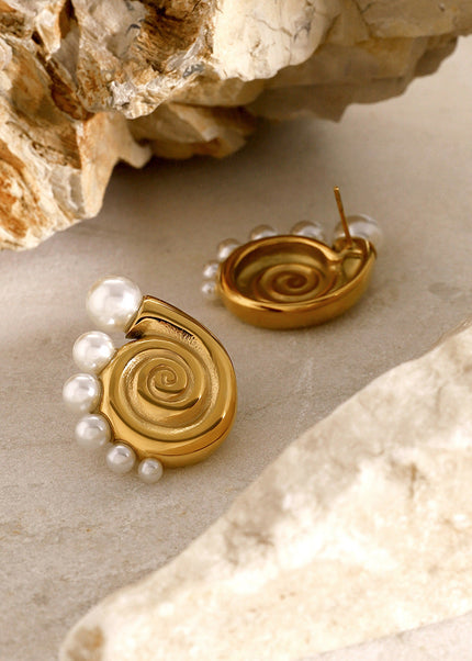 18k gold stainless steel conch earrings women's Europe and America 2024 beach wind conch shell beads titanium steel stud earrings There are left and right sides