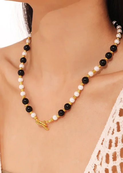 Cross-border light luxury style: black agate, white shell, beaded necklace, clavicle chain, fashionable and versatile temperament, titanium steel OT buckle necklace