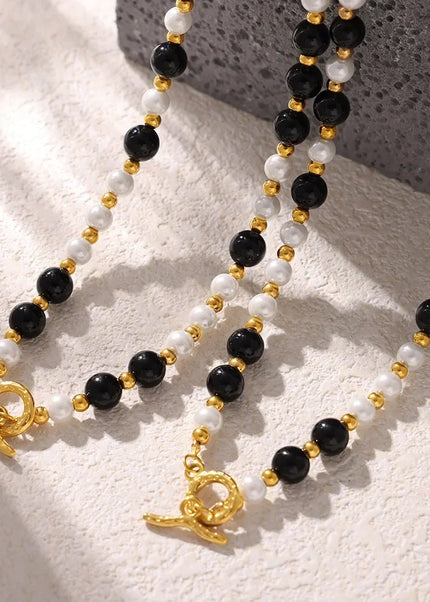 Cross-border light luxury style: black agate, white shell, beaded necklace, clavicle chain, fashionable and versatile temperament, titanium steel OT buckle necklace