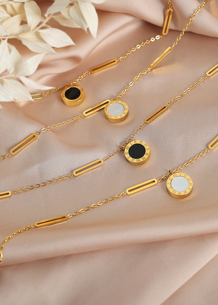 Cross-border new high-end light luxury niche design personality simple titanium steel gold-plated black and white mother-of-pearl necklace jewelry female