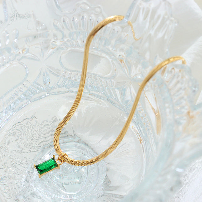 Japanese and Korean style niche design sense titanium steel gold-plated snake bone chain retro style light luxury emerald zircon pendant necklace