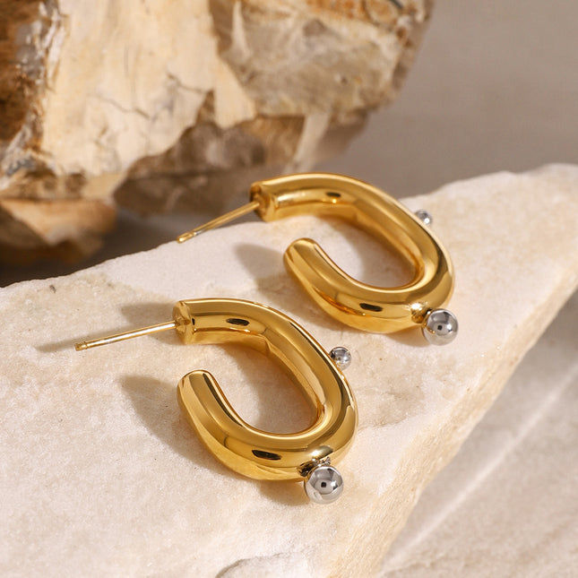 Jieding European and American stainless steel pearl earrings, exaggerated earrings, high-end sense of ins jewelry, electroplated titanium steel earrings, cross-border