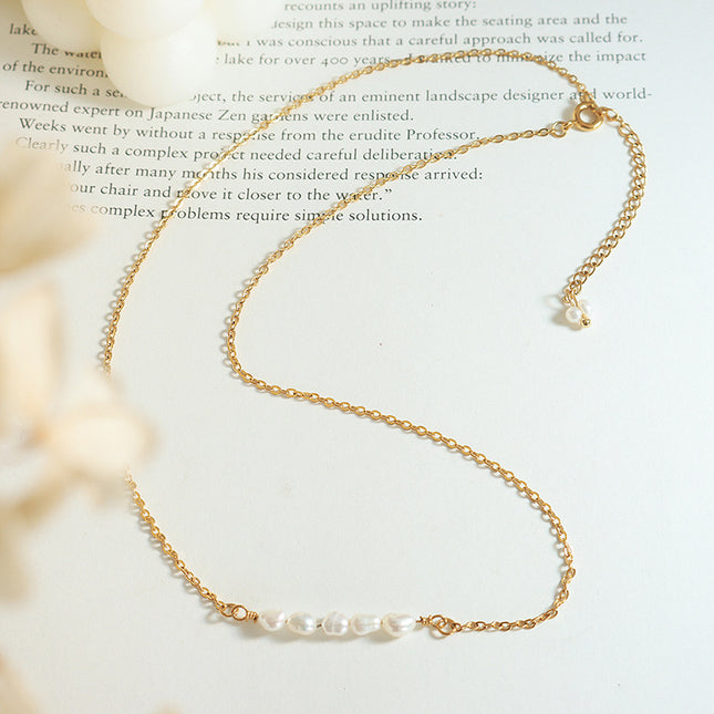Korean version of simple and fashionable temperament freshwater pearl necklace women's ins cold wind light luxury titanium steel plated 18k gold clavicle chain
