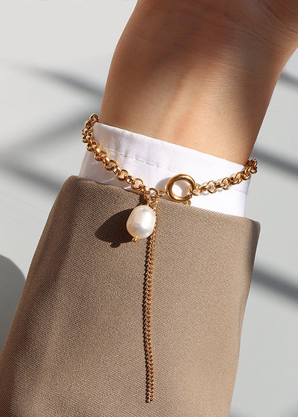 European and American style ins light luxury tassel bracelet, baroque freshwater pearl hand ornament, female titanium steel plated with 18K gold, personality and versatile