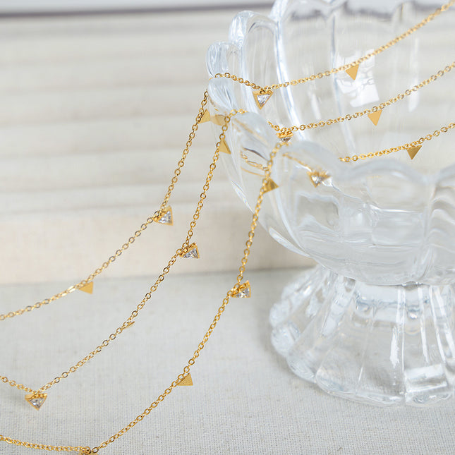 European and American new simple light luxury niche personality triangle diamond clavicle chain versatile titanium steel plated 18K gold necklace women