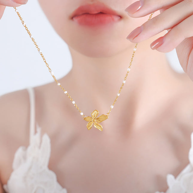 European and American ancient style, simple and niche design, light luxury temperament, new titanium steel flowers, personality dripping oil retro necklace women