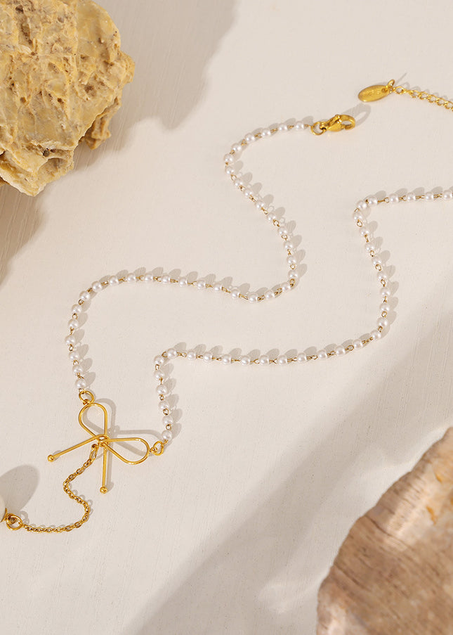 Fairy choker bow imitation pearl necklace ins cold style temperament simple luxury stainless steel clavicle chain