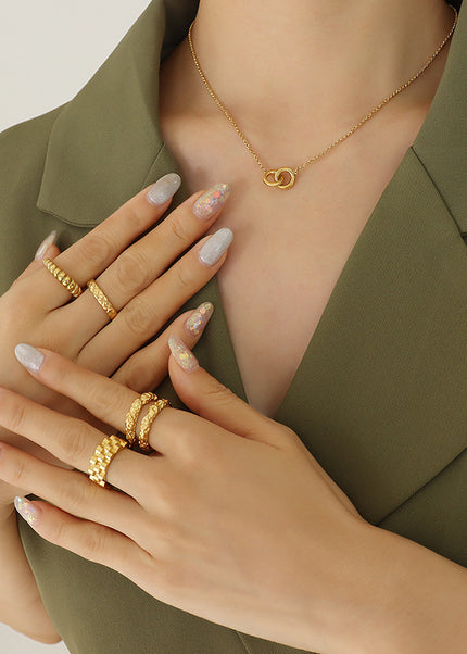 European and American cross-border new high-end light luxury personality design round titanium steel gold-plated interlocking pendant necklace women