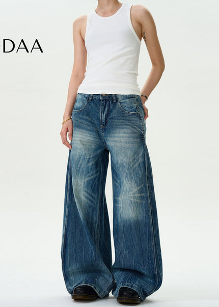 Blue Distressed Burst Wash Jeans for Men and Women - S / Mid Blue - Men’s Jeans