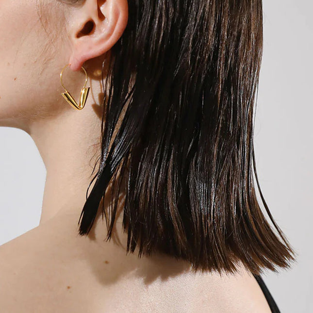 Jieding European and American stainless steel plated 18k gold geometric hollow earrings design sense niche earrings high-end jewelry women