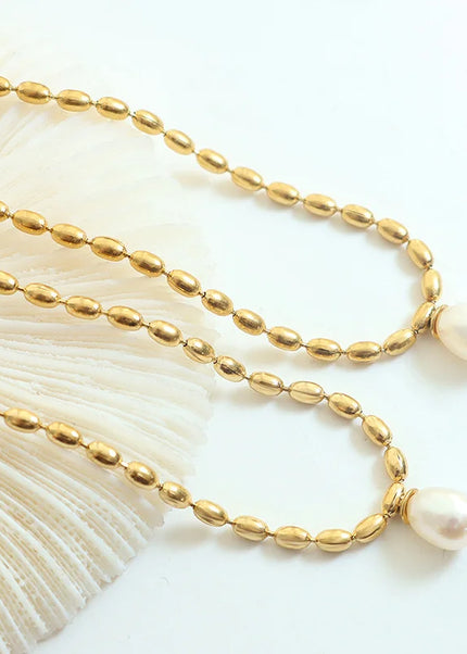 European and American temperament jewelry neutral style cross-border fashion titanium steel gold-plated oval bead chain freshwater pearl pendant necklace