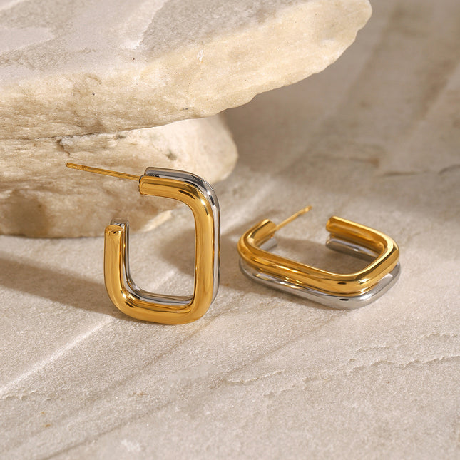 Jieding European and American stainless steel contrasting round earrings high-end niche stud earrings 18k gold titanium steel earrings cross-border