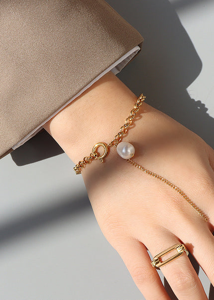 European and American style ins light luxury tassel bracelet, baroque freshwater pearl hand ornament, female titanium steel plated with 18K gold, personality and versatile
