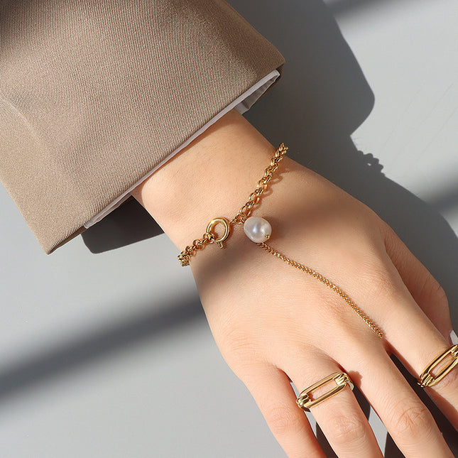European and American style ins light luxury tassel bracelet, baroque freshwater pearl hand ornament, female titanium steel plated with 18K gold, personality and versatile