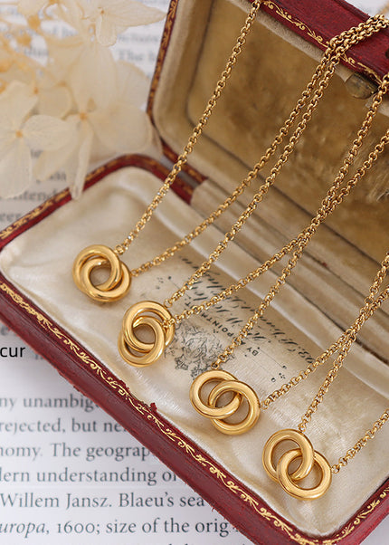European and American cross-border new high-end light luxury personality design round titanium steel gold-plated interlocking pendant necklace women
