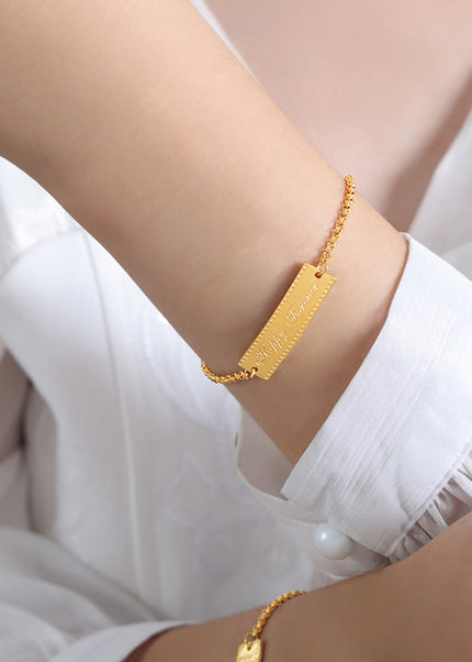 European and American fashion personality long bend brand English letters simple niche design titanium steel does not fade bracelet jewelry wholesale