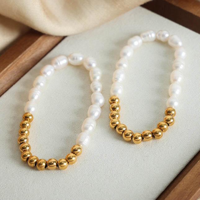 The new light luxury and versatile high-end natural freshwater pearl hand-beaded titanium steel gold-plated bracelet jewelry of the Queen Mother of the West