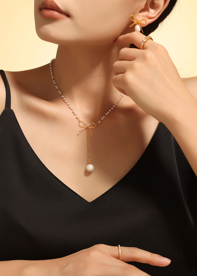 Fairy choker bow imitation pearl necklace ins cold style temperament simple luxury stainless steel clavicle chain