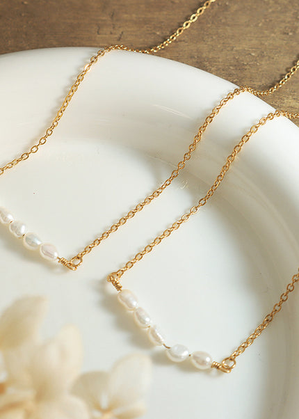 Korean version of simple and fashionable temperament freshwater pearl necklace women's ins cold wind light luxury titanium steel plated 18k gold clavicle chain