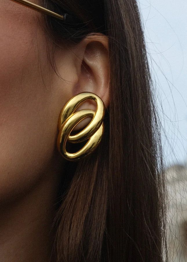18k gold stainless steel gold earrings women's fashion personality simple luxury design O-type double ring titanium steel earrings