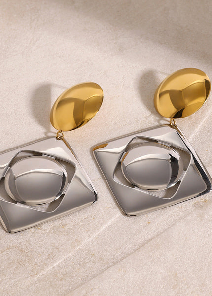 Jieding European and American stainless steel contrasting earrings pendant high-end sense niche round stud earrings titanium steel ear jewelry cross-border women