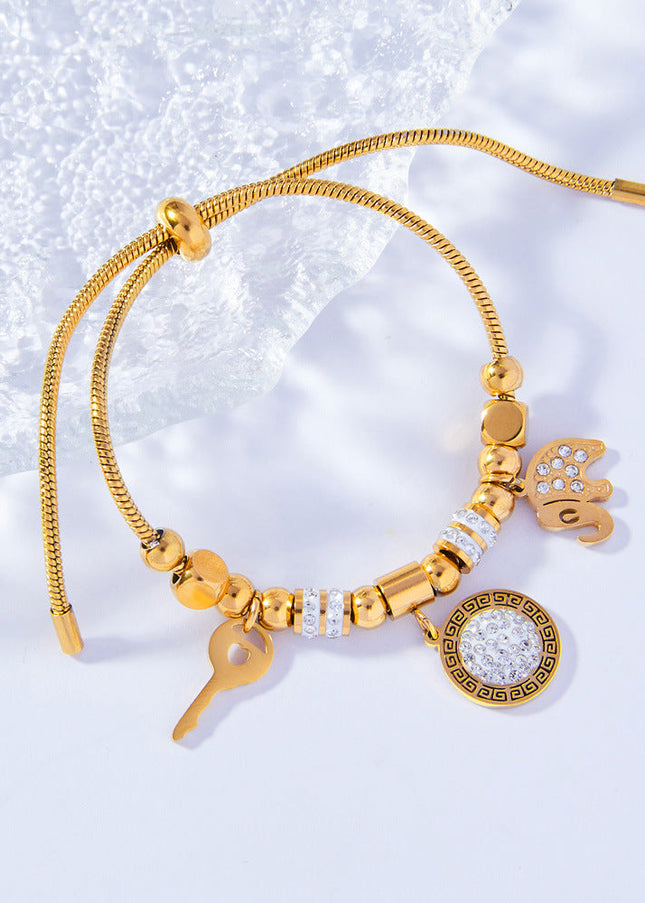 Cross-border hot-selling personality niche pull-out buckle jewelry, multi-element pendant, diamond-encrusted design, titanium steel gold-plated bracelet