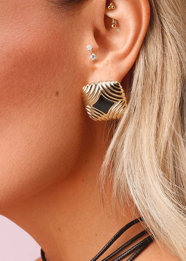 Jieding European and American stainless steel dripping oil earrings, women's light luxury, high-end earrings, titanium steel earrings, non-fading jewelry, cross-border