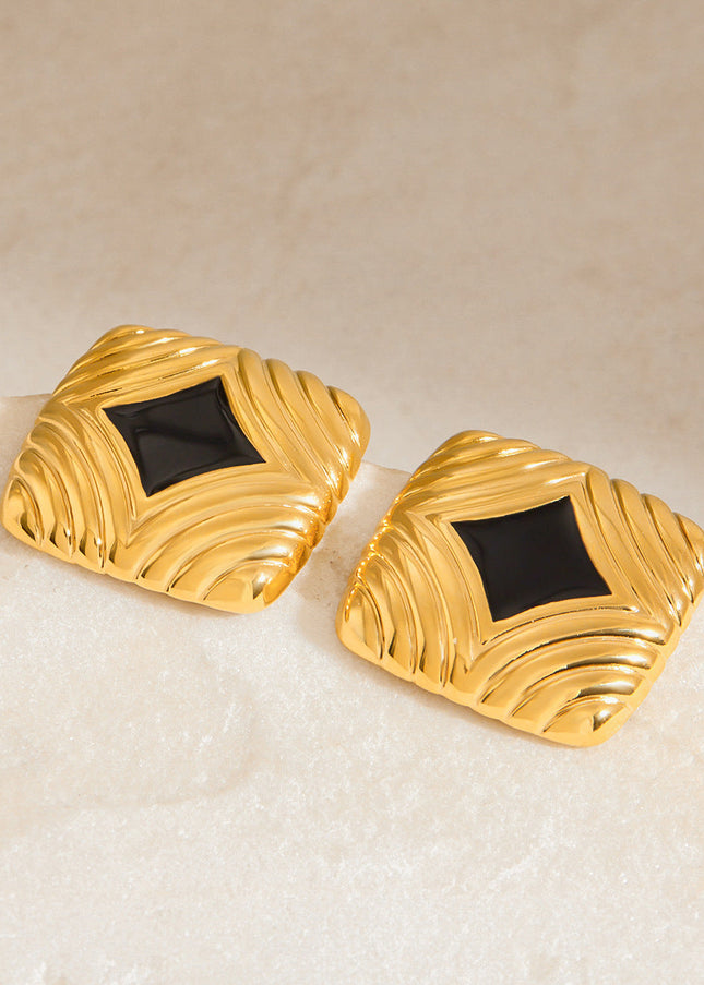 Jieding European and American stainless steel dripping oil earrings, women's light luxury, high-end earrings, titanium steel earrings, non-fading jewelry, cross-border