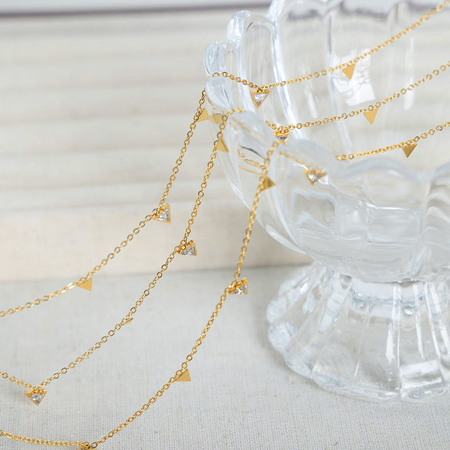 European and American new simple light luxury niche personality triangle diamond clavicle chain versatile titanium steel plated 18K gold necklace women
