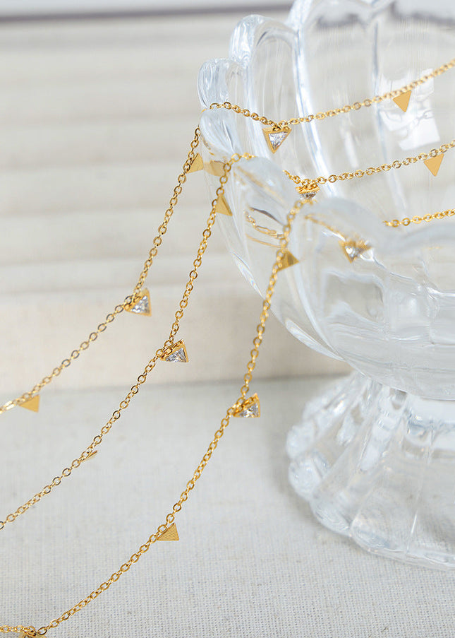 European and American new simple light luxury niche personality triangle diamond clavicle chain versatile titanium steel plated 18K gold necklace women