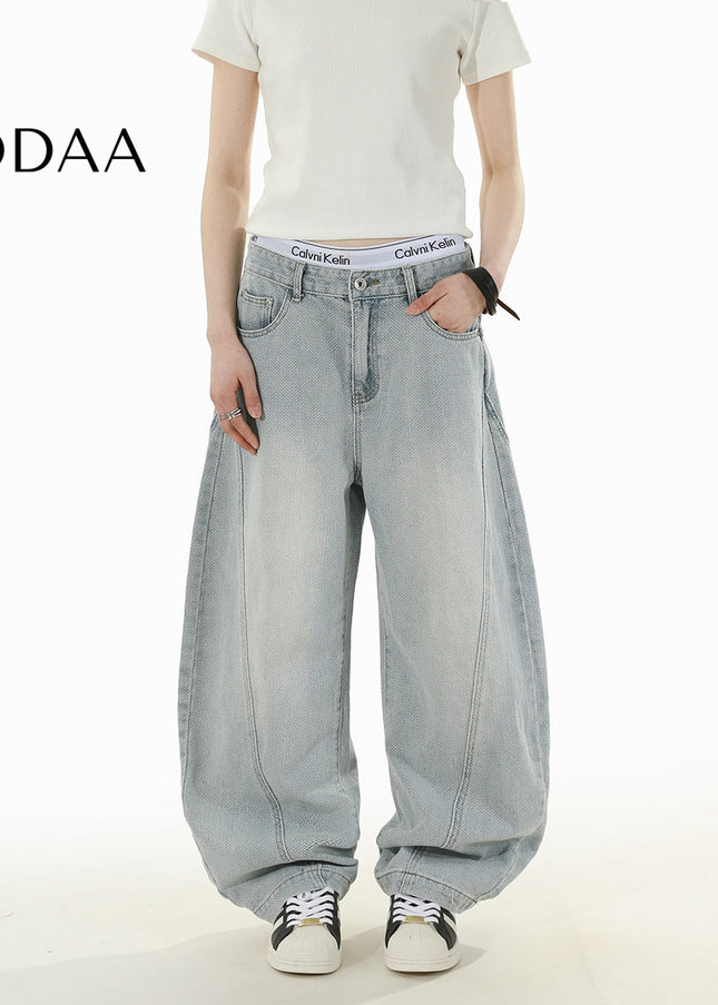 Black Retro Distressed Scimitar Jeans for Men and Women - S / Light Blue - Men’s Jeans