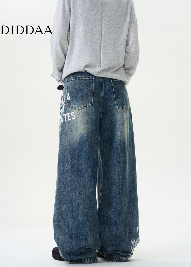 Blue Loose Fit Monogram Print Jeans - Men’s Jeans