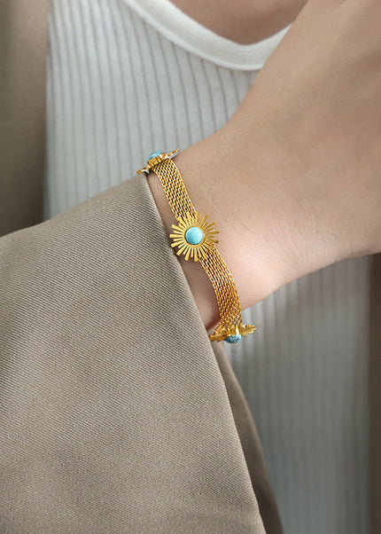 European and American cross-border retro light luxury sense of luxury niche design titanium steel gold-plated flower bracelet fashion personality jewelry women