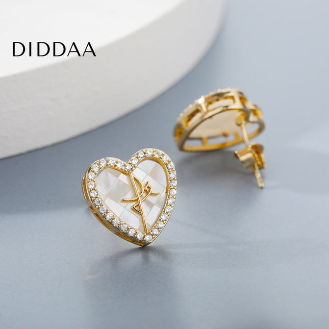 Canelle Earrings | Gold Hollow Heart Zirconia Stud Earrings - Earrings