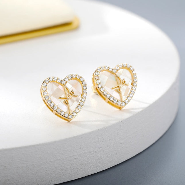 Canelle Earrings | Gold Hollow Heart Zirconia Stud Earrings - Gold - Earrings