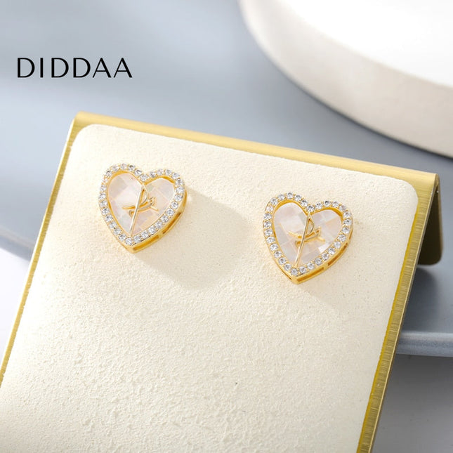 Canelle Earrings | Gold Hollow Heart Zirconia Stud Earrings - Earrings