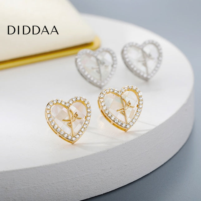 Canelle Earrings | Gold Hollow Heart Zirconia Stud Earrings - Silver - Earrings