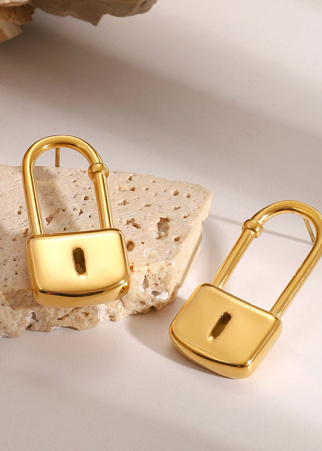 Jieding European and American stainless steel gold earrings, high-end sense of niche, personality earrings, titanium steel stud earrings, cross-border jewelry