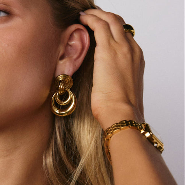 Jieding European and American stainless steel earrings, light luxury, high-end earrings, design sense, niche earrings, titanium steel jewelry, cross-border women