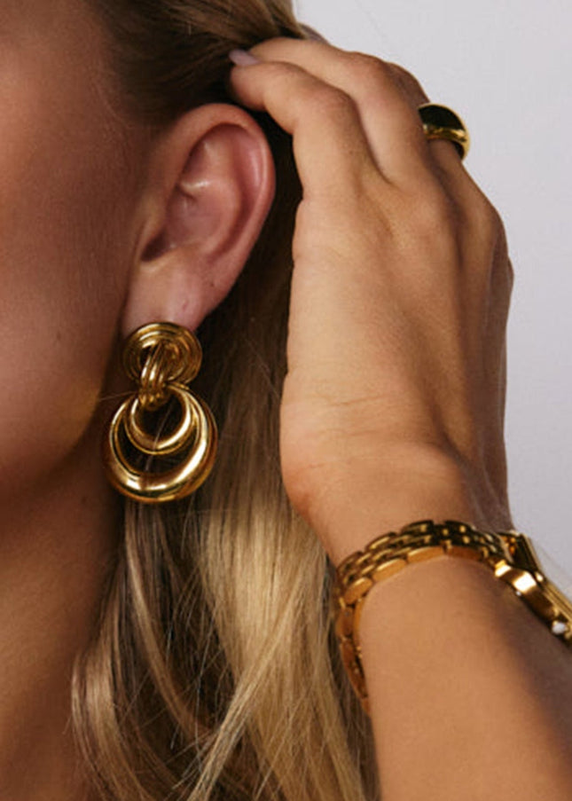 Jieding European and American stainless steel earrings, light luxury, high-end earrings, design sense, niche earrings, titanium steel jewelry, cross-border women