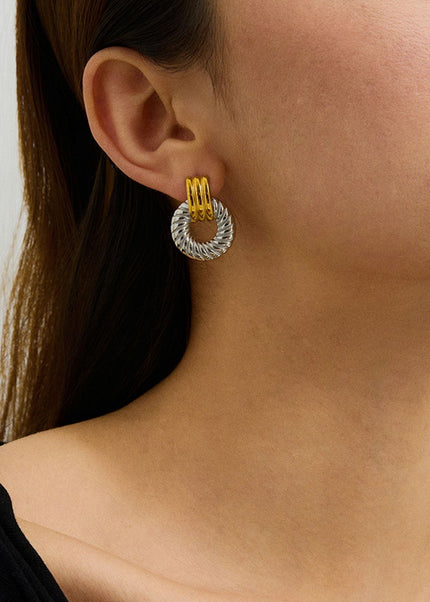 Jieding European and American stainless steel earrings, light luxury, high-end earrings, women's design, niche earrings, titanium steel jewelry, cross-border