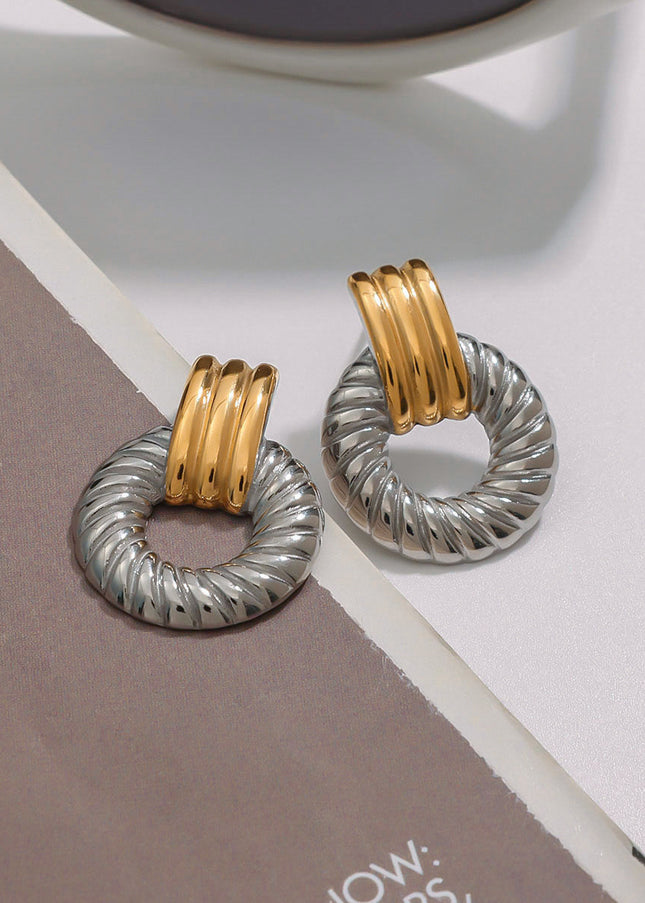 Jieding European and American stainless steel earrings, light luxury, high-end earrings, women's design, niche earrings, titanium steel jewelry, cross-border