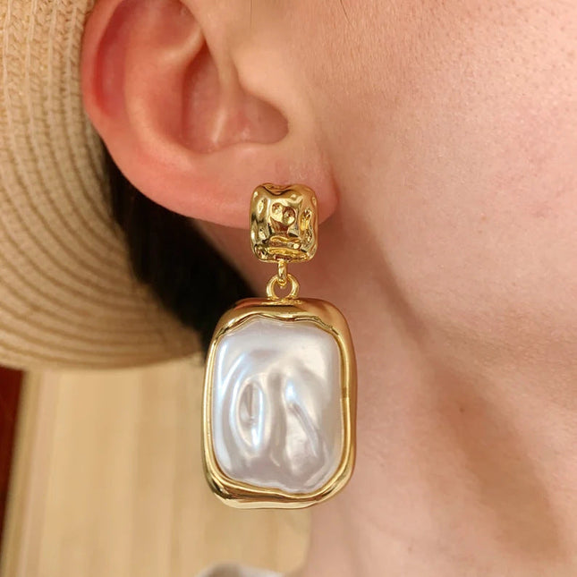 Jieding European and American titanium steel pearl stud earrings high-end light luxury earrings earrings earrings cross-border stainless steel jewelry