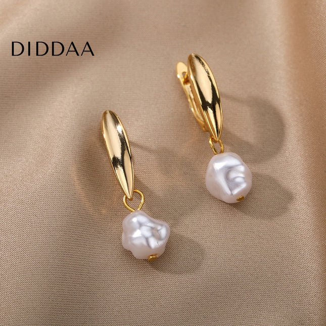 Detente Earrings | Gold Pearl Luxury Drop Earrings - Gold - Earrings