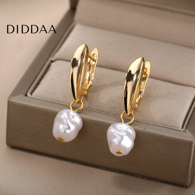 Detente Earrings | Gold Pearl Luxury Drop Earrings - Gold - Earrings