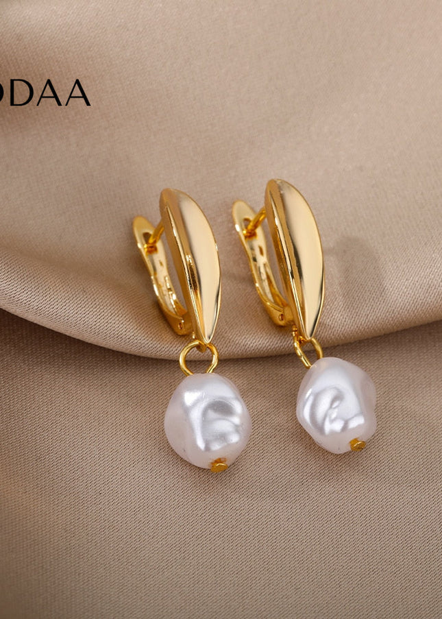 Detente Earrings | Gold Pearl Luxury Drop Earrings - Gold - Earrings
