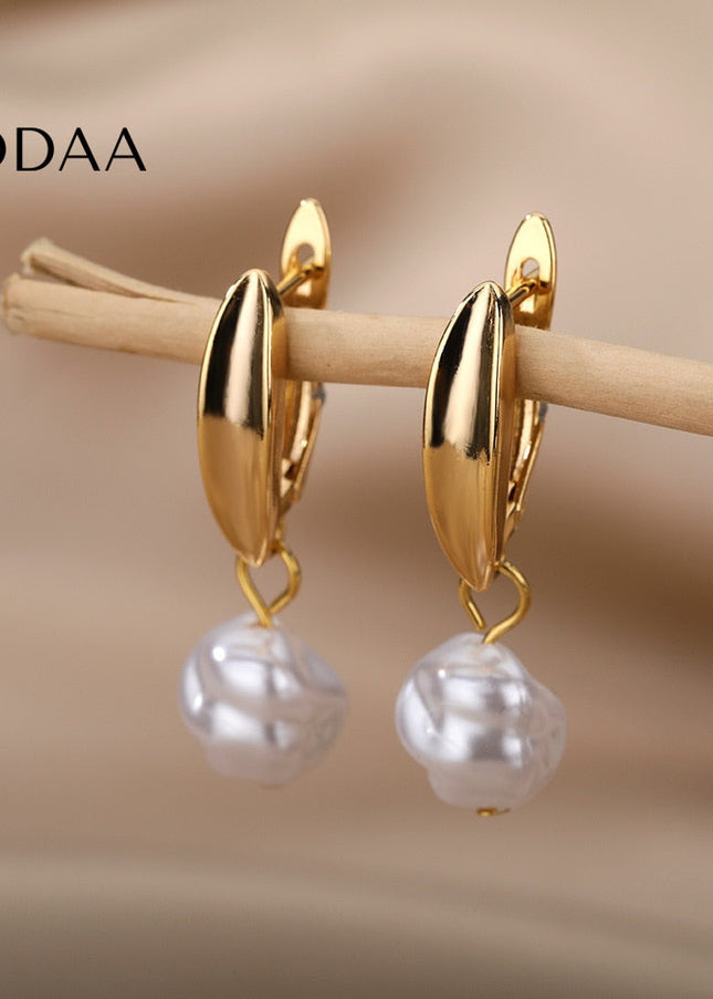 Detente Earrings | Gold Pearl Luxury Drop Earrings - Gold - Earrings