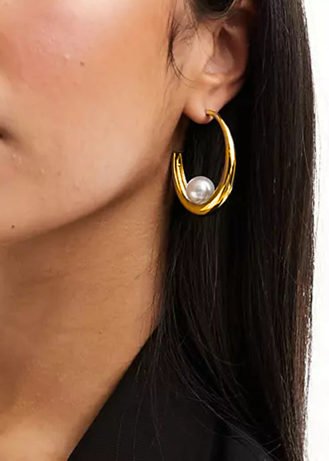 Jieding European and American stainless steel pearl earrings high-end ins exaggerated earrings cross-border jewelry titanium steel stud earrings