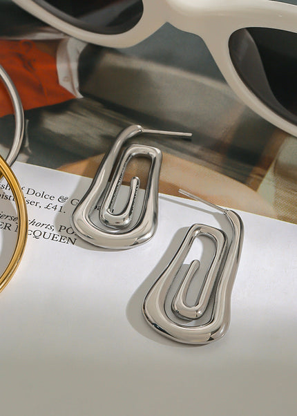 Jieding European and American stainless steel spiral earrings, women's light luxury, high-end earrings, design sense, niche earrings, titanium steel jewelry